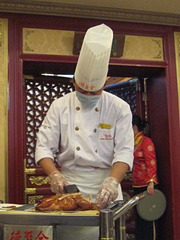 Chef preparing Peking duck