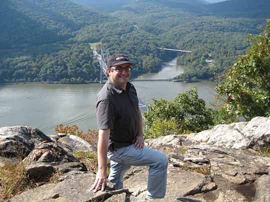 Sam Greenfield overlooking Bear Mountain Bridge from Anthony's Nose